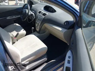2008 Toyota Yaris with VIN JTDBT923781272417, listed as a IAAI auction lot 41880886 with 243,453 mi miles. Bid and sale history available at carsss.com. Image 5.