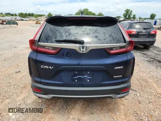 2020 Honda CR-V Touring с VIN 2HKRW2H9XLH631074, выставлен на аукционе Copart как лот 62957255 с пробегом 21 460 миль миль и Списание • Salvage title. История ставок и продаж доступна на DreamBid. Изображение 6.