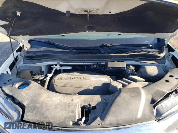 2021 Honda Pilot Elite with VIN 5FNYF6H05MB004870, listed as a Copart auction lot 54119115 with 99,491 mi miles and Salvage title. Bid and sale history available at DreamBid. Image 12.