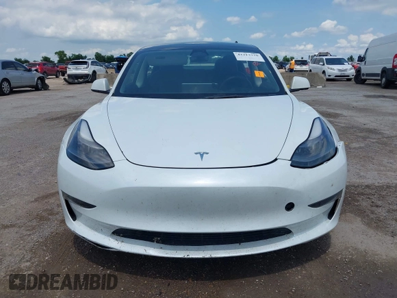 2023 Tesla Model 3 with VIN 5YJ3E1EA5PF407054, listed as a IAAI auction lot 42313770 with 57,621 mi miles and . Bid and sale history available at DreamBid. Image 12.