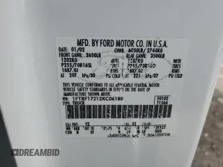 2002 Ford F-150 XL with VIN 1FTRF17212KC06180, listed as a Copart auction lot 45336625 with 214,139 mi miles and Salvage title. Bid and sale history available at DreamBid. Image 13.
