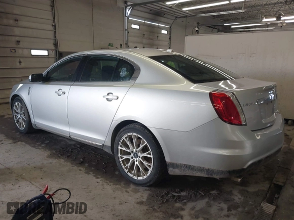 2010 Lincoln MKS with VIN 1LNHL9ER7AG602324, listed as a IAAI auction lot 41757345 with 119,979 mi miles. Bid and sale history available at carsss.com. Image 3.
