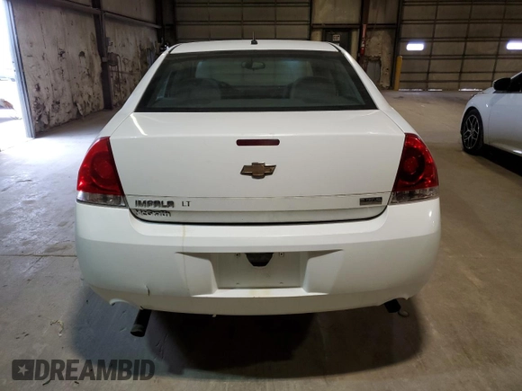 2015 Chevrolet Impala LS with VIN 2G1WA5E38F1124997, listed as a Copart auction lot 53738225 with 129,678 mi miles and Salvage title. Bid and sale history available at DreamBid. Image 6.