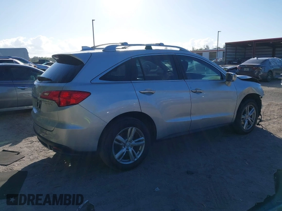 2014 Acura RDX Tech Pkg with VIN 5J8TB3H50EL014951, listed as a IAAI auction lot 41562583 with 129,833 mi miles. Bid and sale history available at carsss.com. Image 4.