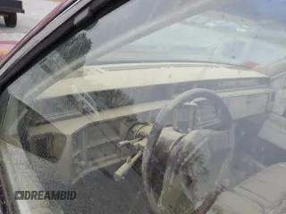1987 Cadillac DeVille z VIN 1G6CD1181H4318101, wystawiony jako Copart lot #75354324 z przebiegiem Nie podano mil oraz Szkoda całkowita • Salvage title. Historia ofert i sprzedaży dostępna na DreamBid. Obrazek 9.