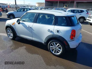 2013 MINI Countryman with VIN WMWZB3C52DWR35806, listed as a IAAI auction lot 42184010 with 93,380 mi miles and . Bid and sale history available at DreamBid. Image 3.