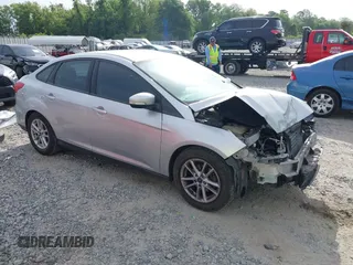 2016 Ford Focus SE z VIN 1FADP3F26GL287656, wystawiony jako IAAI lot #42079655 z przebiegiem 124 849 mil mil oraz . Historia ofert i sprzedaży dostępna na DreamBid. Obrazek 1.