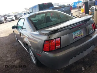 2002 Ford Mustang Standard with VIN 1FAFP40442F212762, listed as a IAAI auction lot 41776411 with 166,183 mi miles. Bid and sale history available at carsss.com. Image 3.