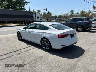 2019 Audi S5 Sportback Premium Plus z VIN WAUB4CF52KA016552, wystawiony jako Copart lot #58973565 z przebiegiem 97 727 mil mil oraz Tytuł czysty. Historia ofert i sprzedaży dostępna na DreamBid. Obrazek 3.