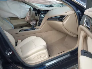 2016 Cadillac CTS Luxury Collection AWD with VIN 1G6AX5SX5G0180953, listed as a IAAI auction lot 41005332 with Not Provided miles and . Bid and sale history available at DreamBid. Image 5.