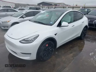 2022 Tesla Model Y Long Range z VIN 7SAYGDEE2NF420882, wystawiony jako IAAI lot #42023642 z przebiegiem 19 783 mil mil oraz . Historia ofert i sprzedaży dostępna na DreamBid. Obrazek 21.