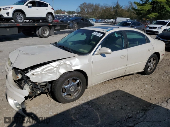 2003 Oldsmobile Aurora z VIN 1G3GS64C034160957, wystawiony jako Copart lot #76566524 z przebiegiem Nie podano mil oraz Szkoda całkowita • Salvage title. Historia ofert i sprzedaży dostępna na DreamBid. Obrazek 1.