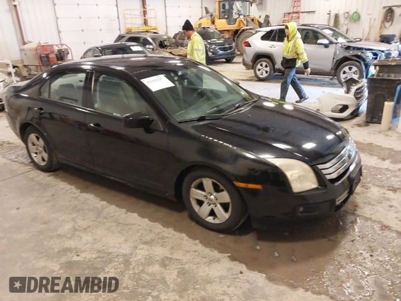 2007 Ford Fusion SE with VIN 3FAHP07147R177289, listed as a IAAI auction lot 41953287 with 218,656 mi miles. Bid and sale history available at carsss.com. Image 1.