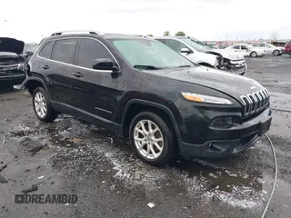 2015 Jeep Cherokee Latitude with VIN 1C4PJLCB0FW676917, listed as a IAAI auction lot 41928270 with 181,134 mi miles and . Bid and sale history available at carsss.com. Image 1.