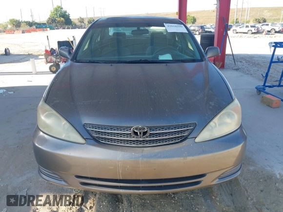 2004 Toyota Camry LE with VIN 4T1BE32KX4U916477, listed as a IAAI auction lot 42018299 with 149,247 mi miles. Bid and sale history available at carsss.com. Image 6.