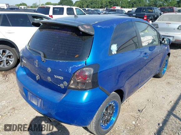 2007 Toyota Yaris with VIN JTDJT923275105210, listed as a IAAI auction lot 42255165 with 142,075 mi miles and . Bid and sale history available at DreamBid. Image 4.
