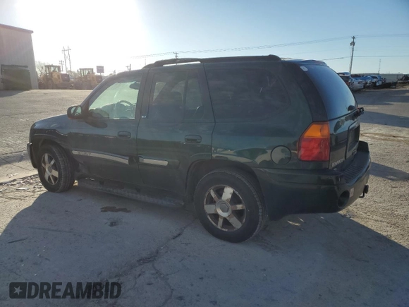 2004 GMC Envoy SLE with VIN 1GKDT13S142197514, listed as a Copart auction lot 89014465 with 202,790 mi miles and Salvage Title. Bid and sale history available at carsss.com. Image 2.