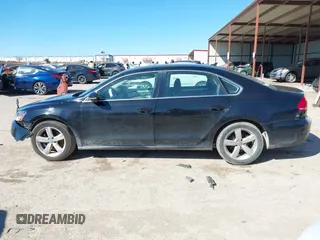 2012 Volkswagen Passat SE with VIN 1VWBH7A32CC047338, listed as a IAAI auction lot 41719936 with 184,255 mi miles. Bid and sale history available at carsss.com. Image 13.