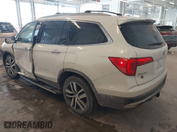 2017 Honda Pilot Touring with VIN 5FNYF6H92HB032873, listed as a IAAI auction lot 41608870 with 123,888 mi miles. Bid and sale history available at carsss.com. Image 3.