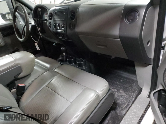 2007 Ford F-150 XL with VIN 1FTVX14527NA78614, listed as a Copart auction lot 45945555 with 297,404 mi miles and Salvage Title. Bid and sale history available at carsss.com. Image 8.