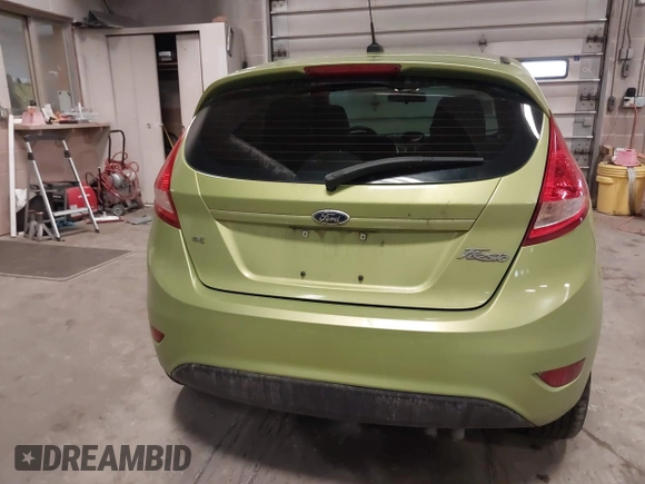 2013 Ford Fiesta SE with VIN 3FADP4EJ9DM131913, listed as a IAAI auction lot 41677333 with 54,673 mi miles. Bid and sale history available at carsss.com. Image 16.