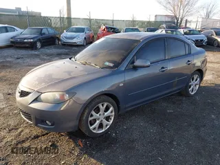 2008 Mazda 3 i Touring Value with VIN JM1BK32G181149702, listed as a IAAI auction lot 41800136 with 205,677 mi miles. Bid and sale history available at carsss.com. Image 2.