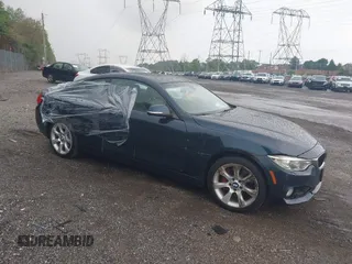 2014 BMW 4 Series 435i xDrive with VIN WBA3R5C58EK188668, listed as a IAAI auction lot 39946954 with 89,513 mi miles and . Bid and sale history available at carsss.com. Image 1.