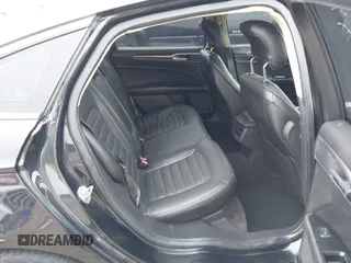 2014 Ford Fusion SE with VIN 1FA6P0HDXE5356467, listed as a IAAI auction lot 41252963 with 147,252 mi miles and . Bid and sale history available at DreamBid. Image 8.