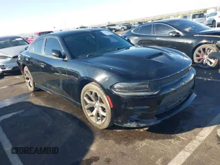 2018 Dodge Charger SXT Plus with VIN 2C3CDXHG8JH217910, listed as a IAAI auction lot 37772473 with 51,761 mi miles and . Bid and sale history available at carsss.com. Image 1.