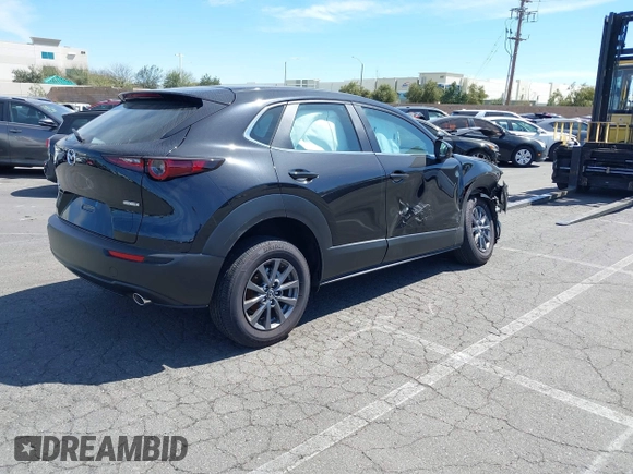 2024 Mazda CX-30 2.5 S with VIN 3MVDMBAM5RM687164, listed as a IAAI auction lot 41465592 with 4,705 mi miles. Bid and sale history available at carsss.com. Image 4.