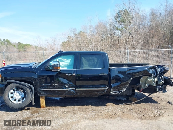 2019 GMC Sierra 2500HD Denali with VIN 1GT12SEY3KF207121, listed as a IAAI auction lot 38782753 with 87,337 mi miles. Bid and sale history available at carsss.com. Image 15.