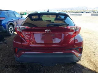 2019 Toyota C-HR XLE with VIN JTNKHMBX8K1032206, listed as a IAAI auction lot 41852134 with 136,107 mi miles. Bid and sale history available at carsss.com. Image 16.