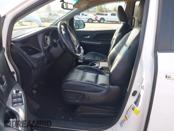 2015 Toyota Sienna SE with VIN 5TDXK3DC6FS627578, listed as a IAAI auction lot 41568684 with 124,138 mi miles and . Bid and sale history available at DreamBid. Image 5.
