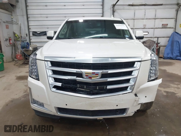2015 Cadillac Escalade Luxury z VIN 1GYS4MKJ0FR566796, wystawiony jako IAAI lot #42044792 z przebiegiem 176 162 mil mil oraz . Historia ofert i sprzedaży dostępna na DreamBid. Obrazek 12.