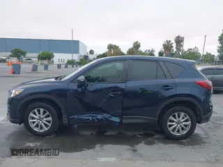 2016 Mazda CX-5 Sport с VIN JM3KE2BY2G0856071, выставлен на аукционе IAAI как лот 42473128 с пробегом 57 250 миль миль и . История ставок и продаж доступна на DreamBid. Изображение 14.