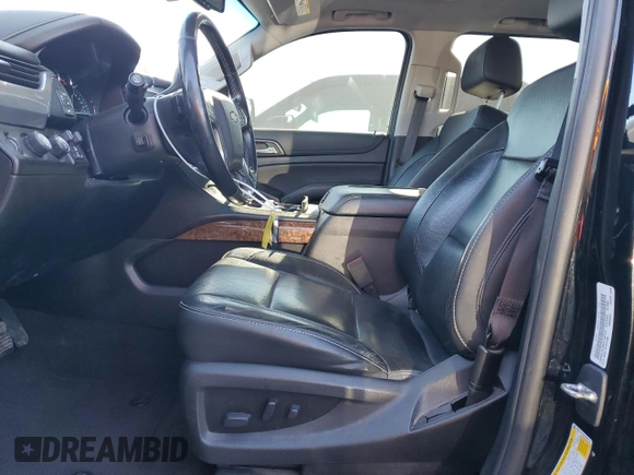 2019 Chevrolet Suburban Premier with VIN 1GNSKJKJ6KR134774, listed as a Copart auction lot 76118314 with 69,523 mi miles and Salvage Title. Bid and sale history available at DreamBid. Image 7.