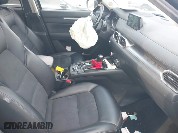 2018 Mazda CX-5 Touring z VIN JM3KFACM3J1435089, wystawiony jako IAAI lot #41130041 z przebiegiem 80 446 mil mil oraz . Historia ofert i sprzedaży dostępna na DreamBid. Obrazek 5.