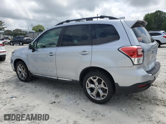 2017 Subaru Forester Touring with VIN JF2SJAWC6HH556728, listed as a Copart auction lot 54914055 with 112,686 mi miles and Salvage title. Bid and sale history available at DreamBid. Image 2.