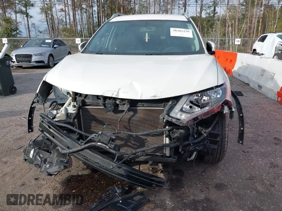 2018 Nissan Rogue S with VIN KNMAT2MT5JP594833, listed as a IAAI auction lot 38383239 with 133,466 mi miles and . Bid and sale history available at carsss.com. Image 6.