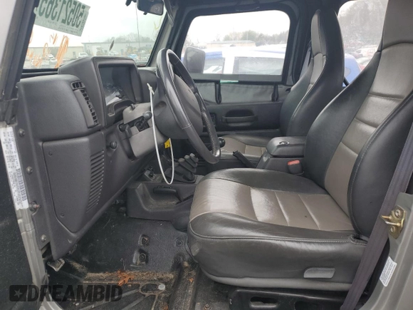 2000 Jeep Wrangler Sport with VIN 1J4FA49S4YP789348, listed as a Copart auction lot 50521365 with 0 mi miles and Salvage Title. Bid and sale history available at carsss.com. Image 7.