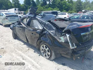 2008 Cadillac CTS RWD with VIN 1G6DF577080143965, listed as a IAAI auction lot 39774534 with 154,289 mi miles and . Bid and sale history available at DreamBid. Image 3.