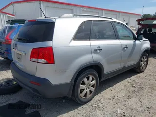 2012 Kia Sorento LX with VIN 5XYKT4A26CG292968, listed as a IAAI auction lot 42066841 with 215,295 mi miles. Bid and sale history available at carsss.com. Image 4.
