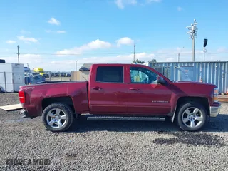 2015 Chevrolet Silverado 1500 LT with VIN 3GCUKREC0FG263001, listed as a IAAI auction lot 41735790 with 266,727 mi miles. Bid and sale history available at carsss.com. Image 13.
