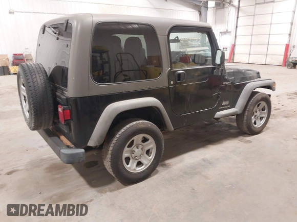 2006 Jeep Wrangler Sport Right Hand Drive with VIN 1J4F449S56P741328, listed as a IAAI auction lot 41476847 with 67,203 mi miles. Bid and sale history available at carsss.com. Image 4.