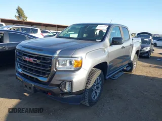 2021 GMC Canyon 4WD AT4 w/Leather with VIN 1GTG6FEN9M1123638, listed as a IAAI auction lot 41852163 with 77,442 mi miles. Bid and sale history available at carsss.com. Image 2.