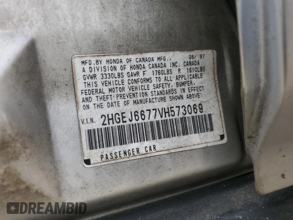 1997 Honda Civic LX z VIN 2HGEJ6677VH573069, wystawiony jako Copart lot #59739065 z przebiegiem 287 987 mil mil oraz Szkoda całkowita • Salvage title. Historia ofert i sprzedaży dostępna na DreamBid. Obrazek 13.