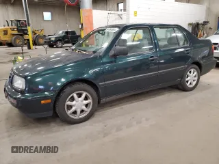 1998 Volkswagen Jetta z VIN 3VWSA81H5WM126169, wystawiony jako Copart lot #84884894 z przebiegiem 32 759 mil mil oraz Czysty tytuł • Clean title. Historia ofert i sprzedaży dostępna na DreamBid. Obrazek 1.