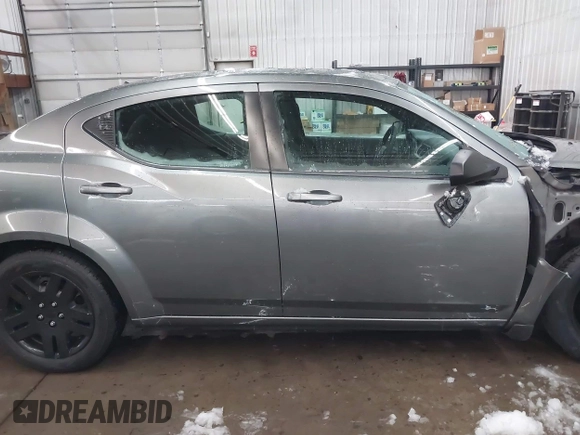 2013 Dodge Avenger SE with VIN 1C3CDZAB1DN581303, listed as a IAAI auction lot 41942469 with 123,330 mi miles. Bid and sale history available at carsss.com. Image 14.