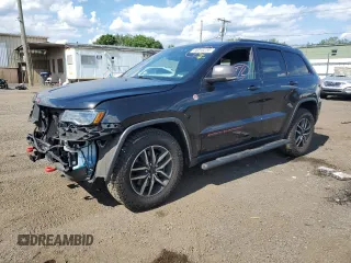 2019 Jeep Grand Cherokee Trailhawk z VIN 1C4RJFLT8KC726784, wystawiony jako Copart lot #66010235 z przebiegiem 136 683 mil mil oraz Szkoda całkowita • Salvage title. Historia ofert i sprzedaży dostępna na DreamBid. Obrazek 1.