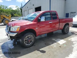 2004 Nissan Titan SE with VIN 1N6AA06B24N503397, listed as a Copart auction lot 52026215 with 239,337 mi miles and Salvage title. Bid and sale history available at DreamBid. Image 1.